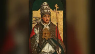 San Gregorio Magno con la tiara papal y la cruz, la paloma del Espíritu Santo sobre su hombro
