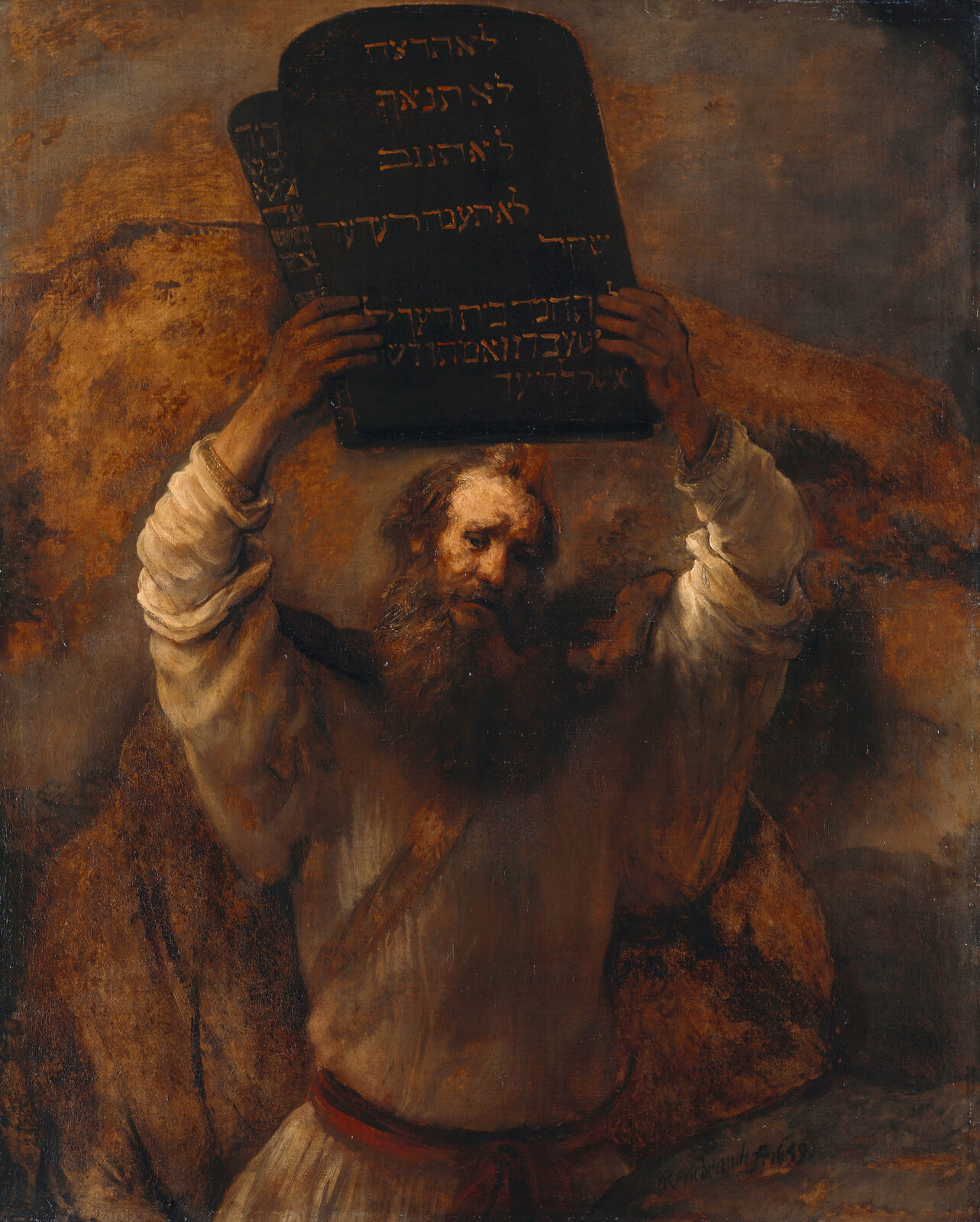 Moses holding the tablets of the Law, a painting by Rembrandt.